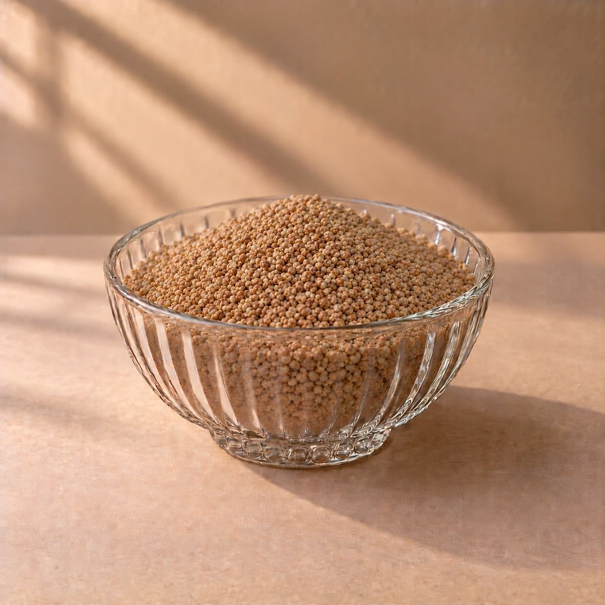 Browntop Millet in a glass bowl
