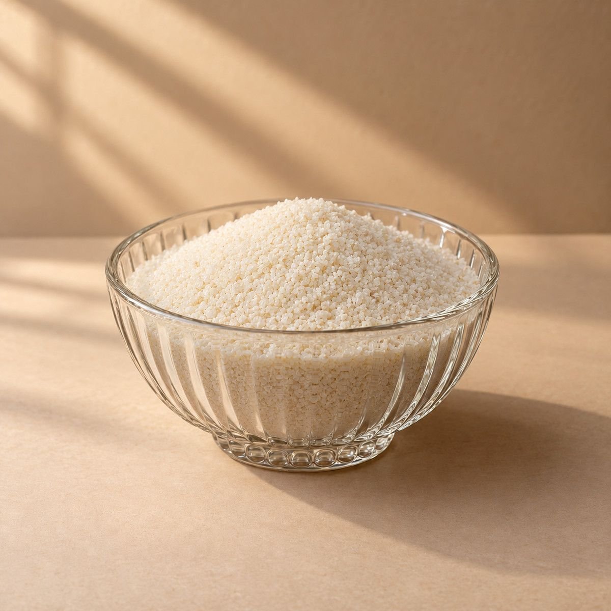 Idli Sooji in a glass bowl