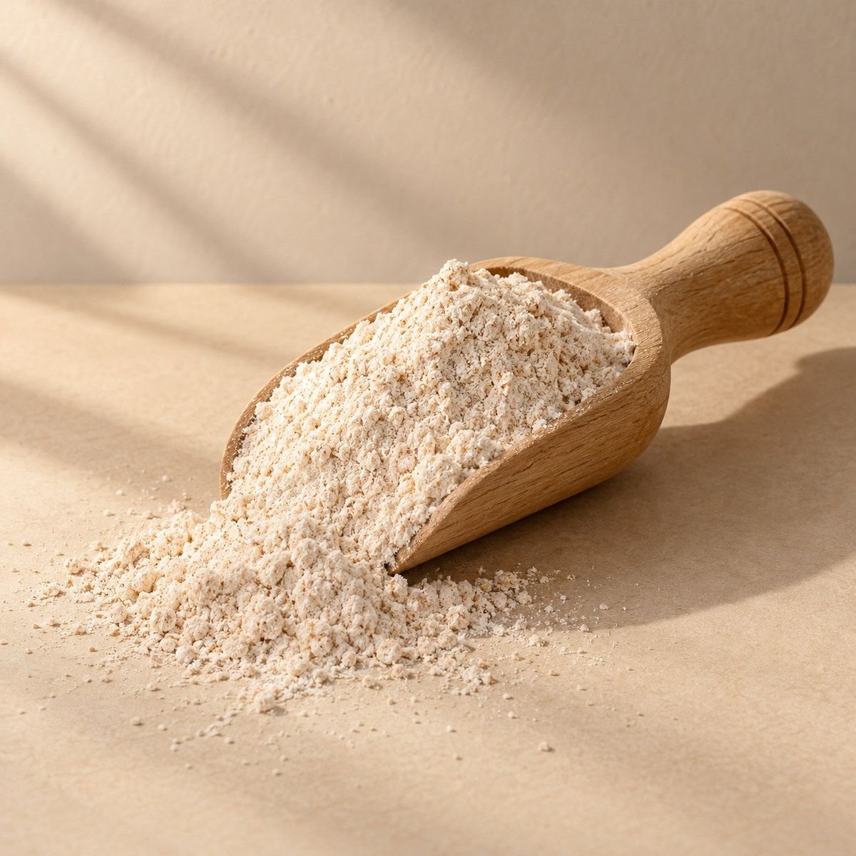 Whole Wheat Flour in a wooden scoop